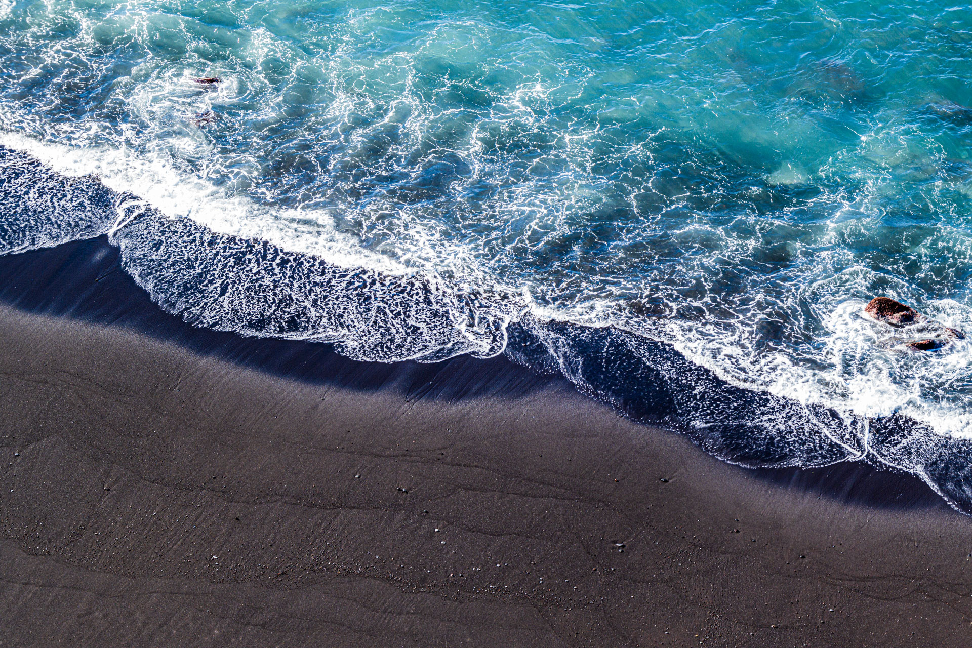 Welle am Strand