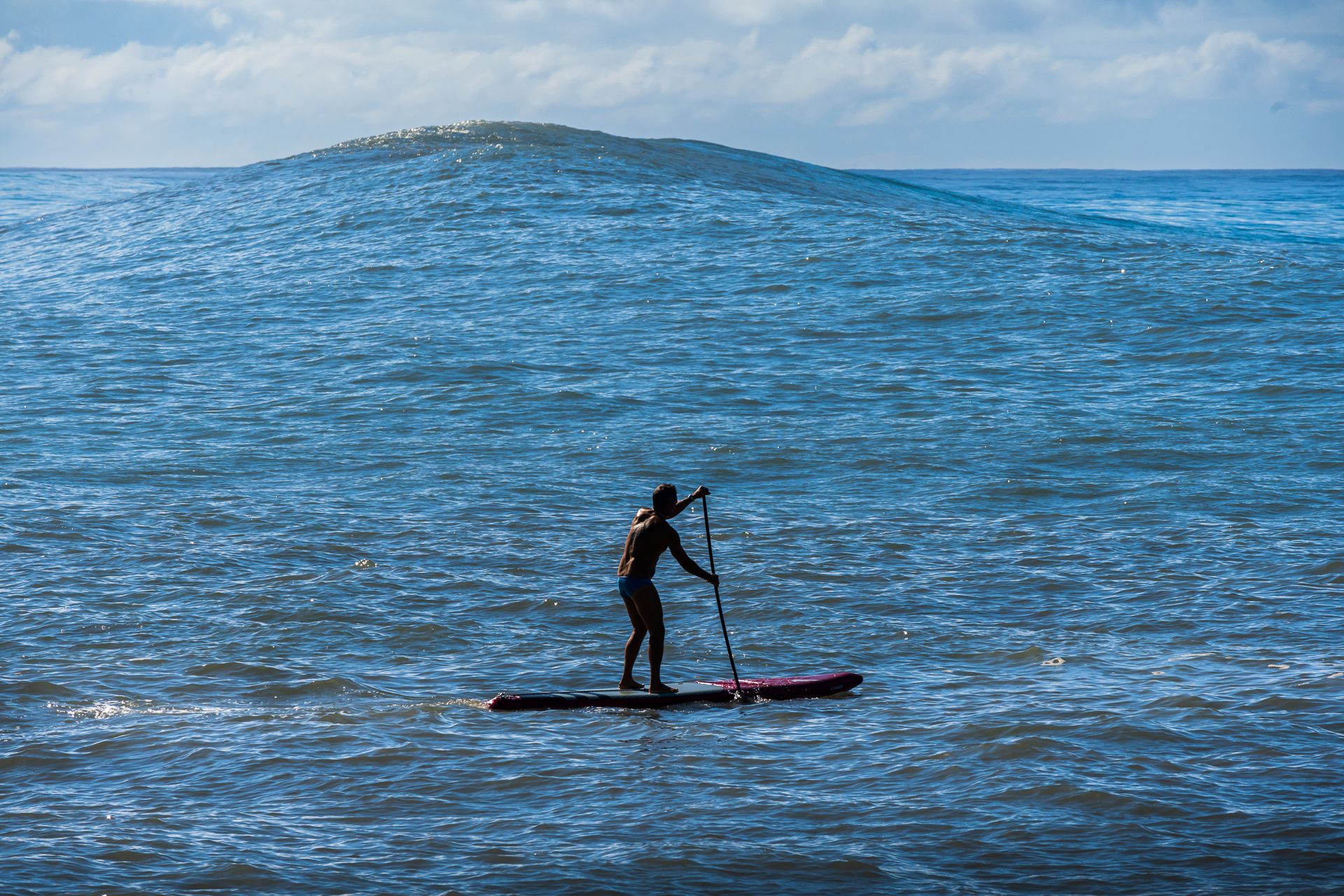 Stand up Paddling in der Welle